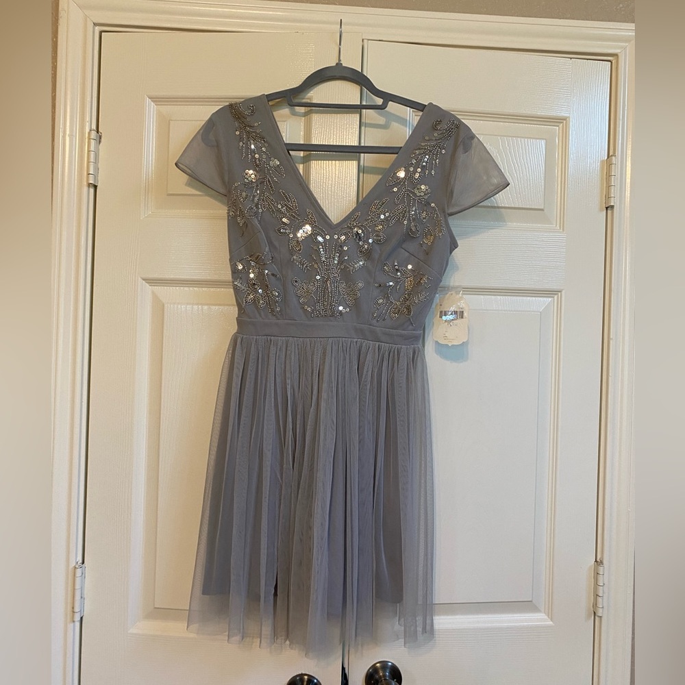 Sequenced altar’d state dress